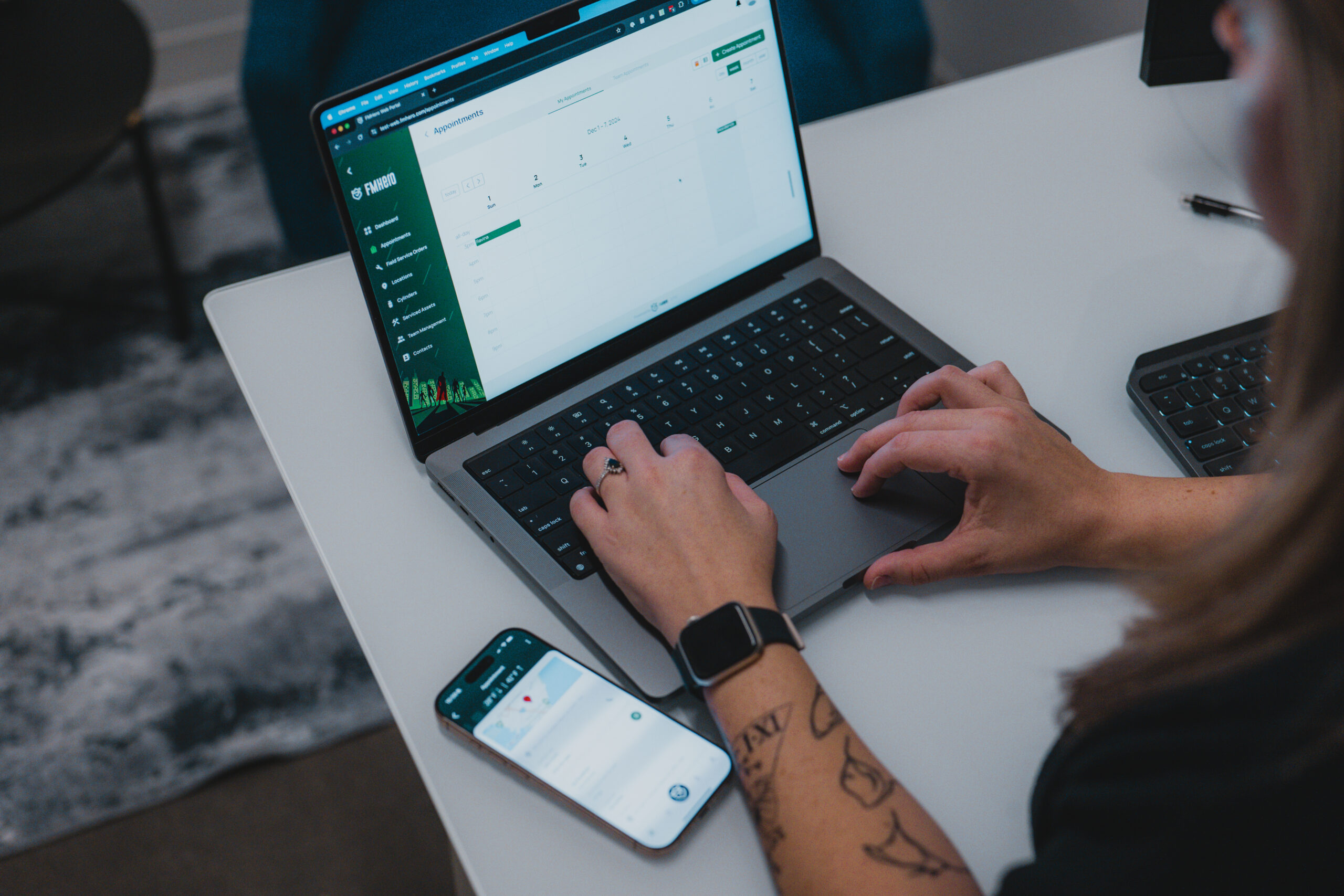 office staff working with web app and mobile app